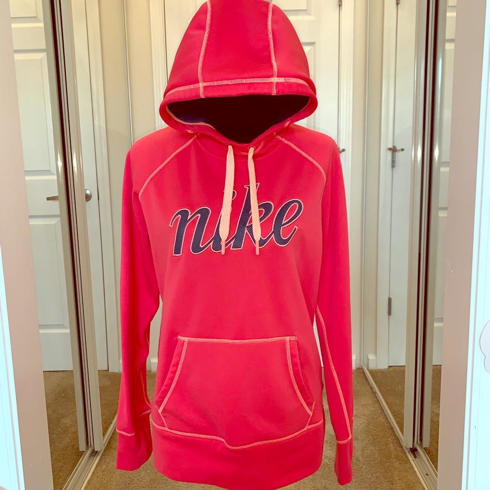 NIKE ThermaFit Tangerine Hoodie pocket & thumbhole